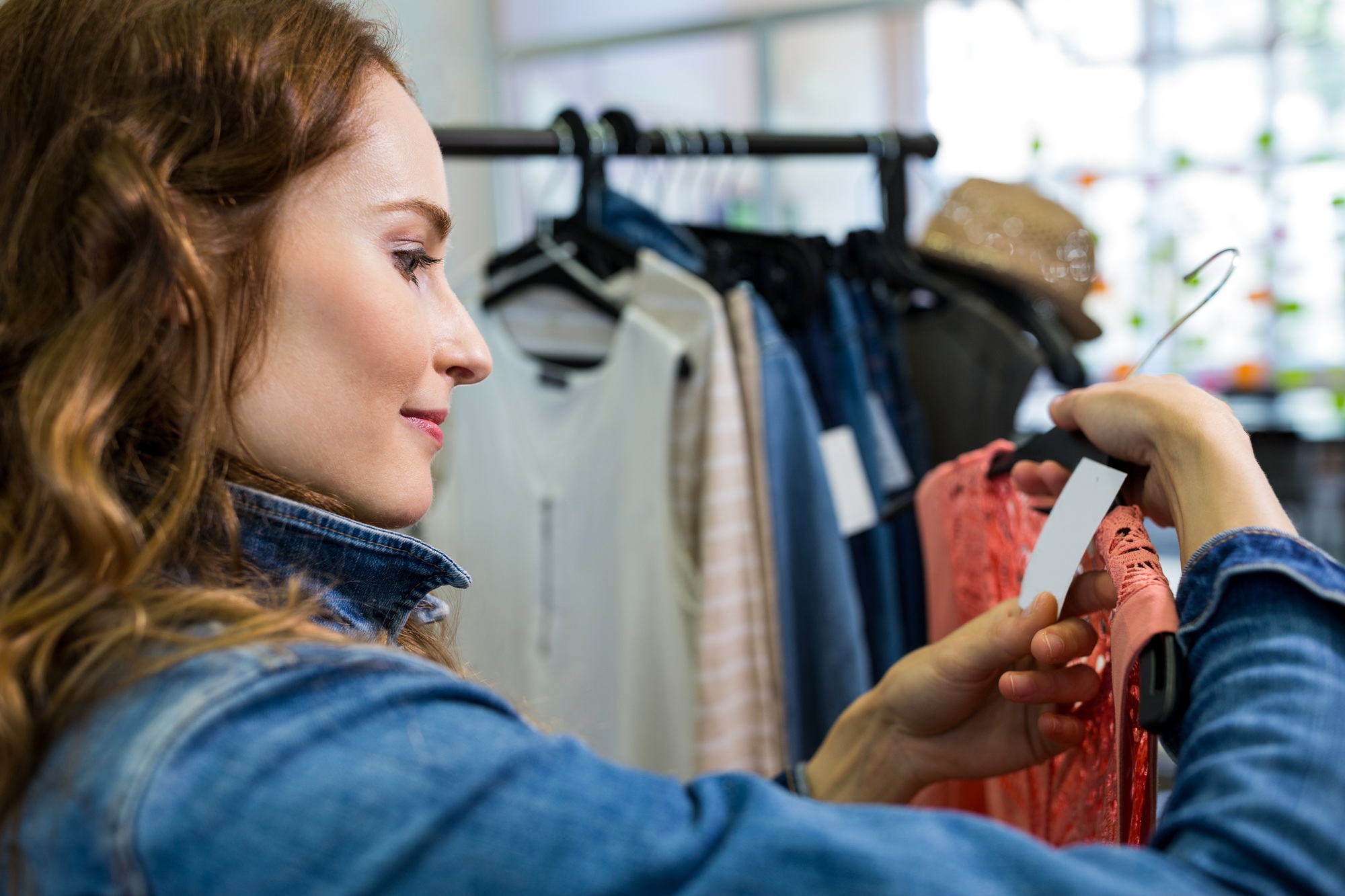 Woman doing shopping at clothes store